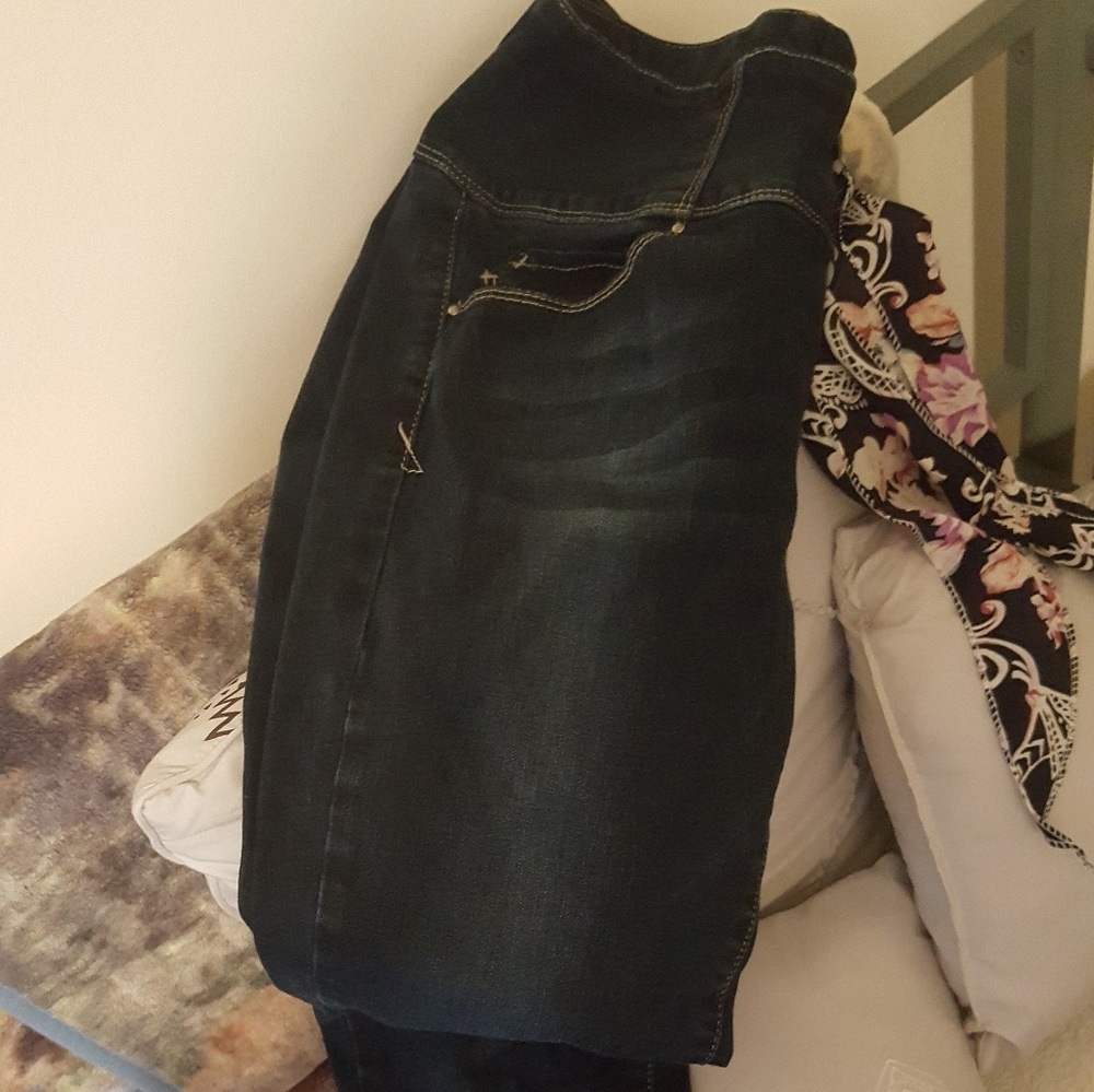 Jeans/zip up in the back with pockets